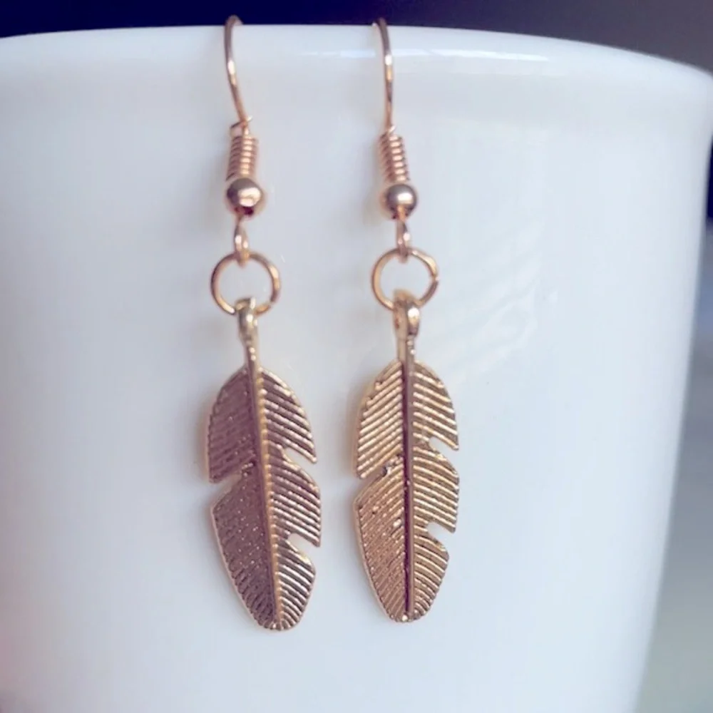 Gold leaf dangle earrings